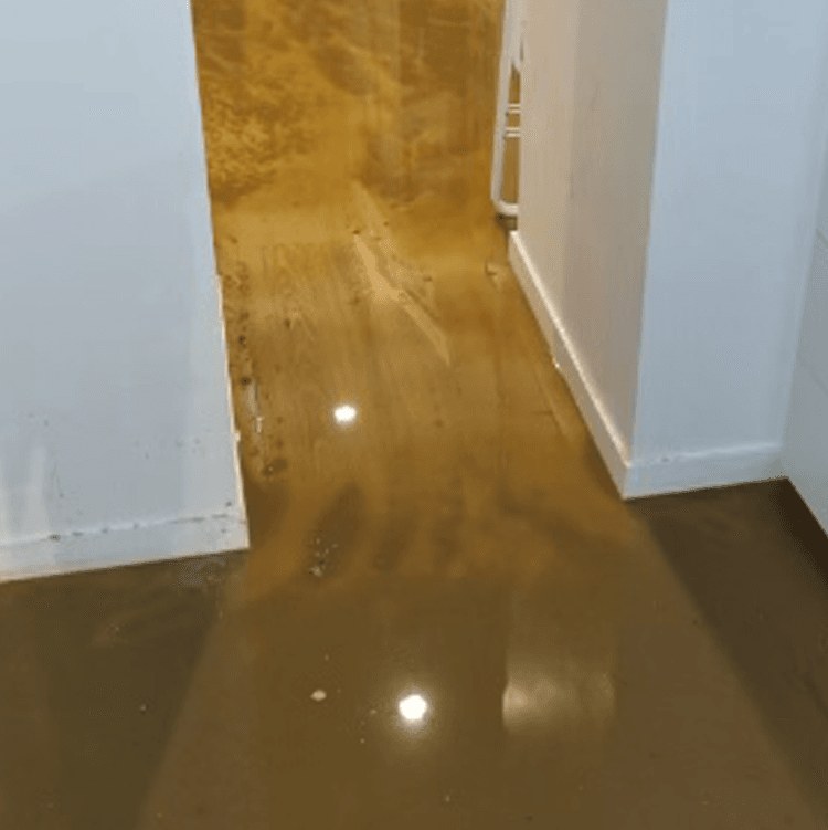 Flooded bathroom and water damage response